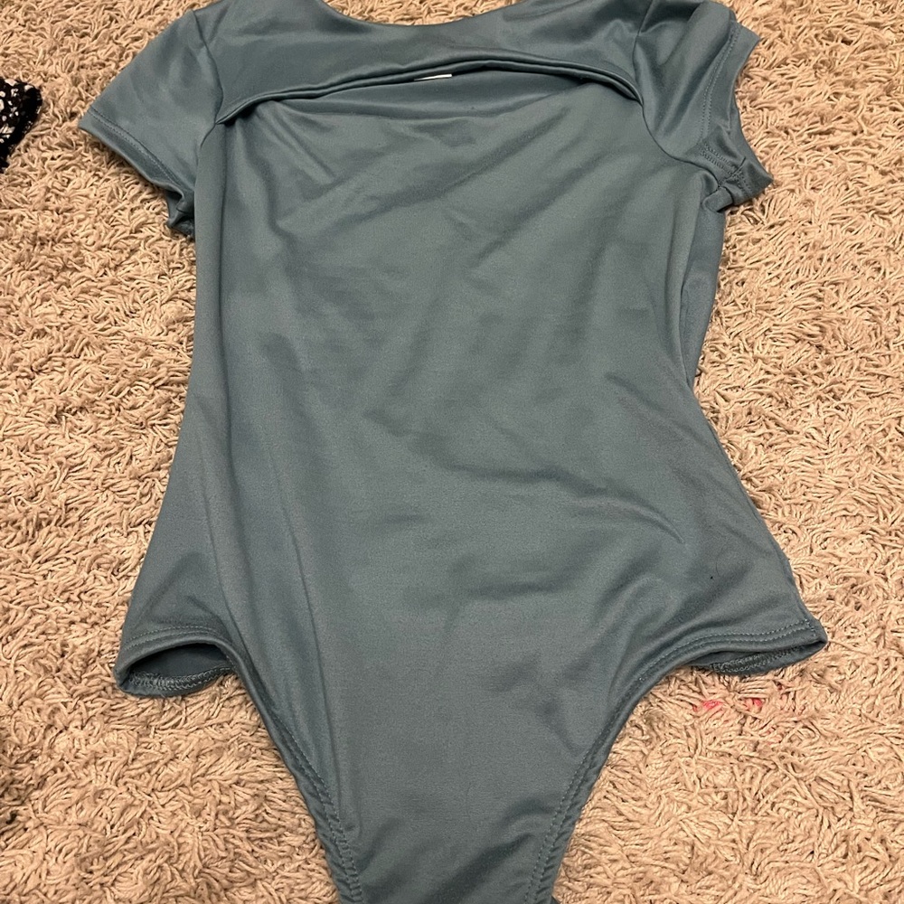 Women’s bodysuit in Teal with an open chest
